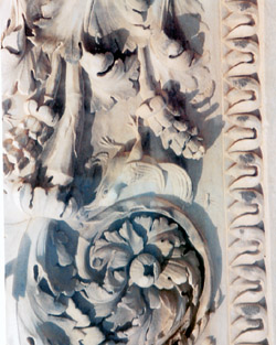 Pompeii and Boscoreale Antiquarium tour - Detail in marble of the doorway of the building of Eumachia