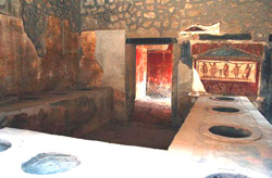 Pompeii Volcano - One of many thermopolia found in Pompei